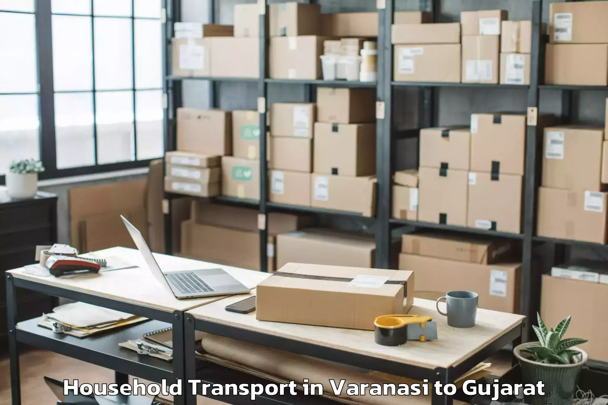 Top Varanasi to Dantiwada Household Transport Available